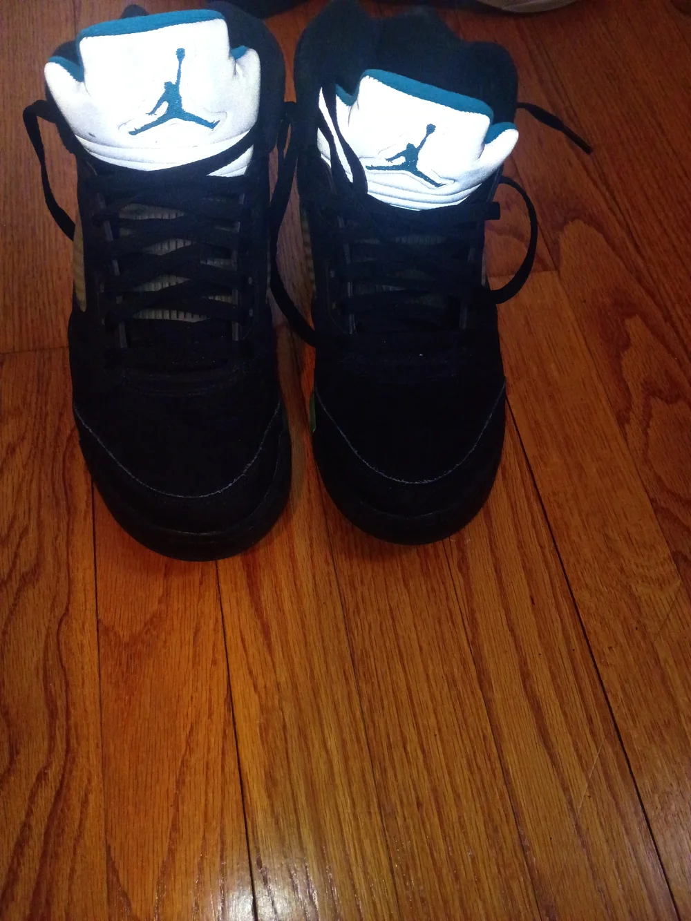 Jordan Men’s Black High-Top Sneakers with Yellow and Teal Accents